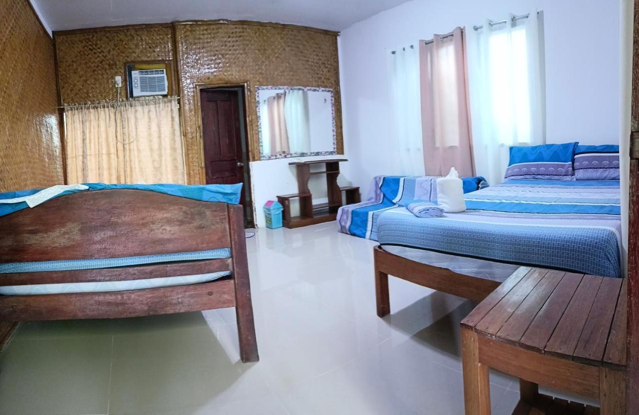 Victoria Guest House And Cottages Puerto Princesa Exterior photo
