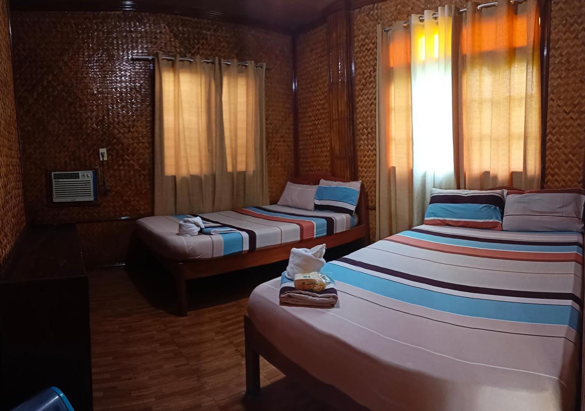 Victoria Guest House And Cottages Puerto Princesa Exterior photo
